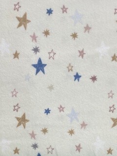 Safari Stargazer Flannel - Multi coloured stars on cream background