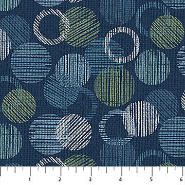 Dots & Dashes Flannel - Overlapping circles of green, aqua & white on dark blue background